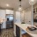 kitchen with an island, modern appliances and spacious counter-space