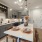 kitchen with an island, modern appliances and spacious counter-space